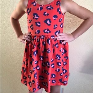 Selection of 4 H&M kids sundresses.